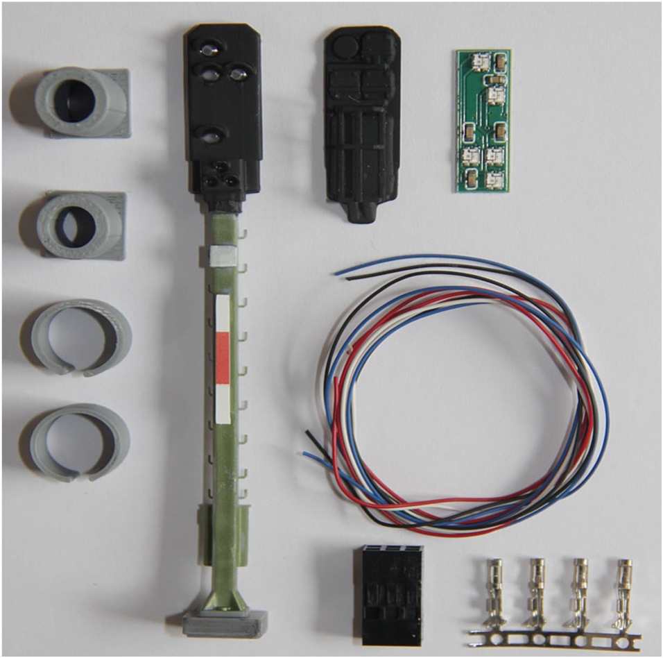 Beispiel eines Signalbausatzes mit Signalkomponenten, LED-Platine, Anschlussleitungen und Zubehör